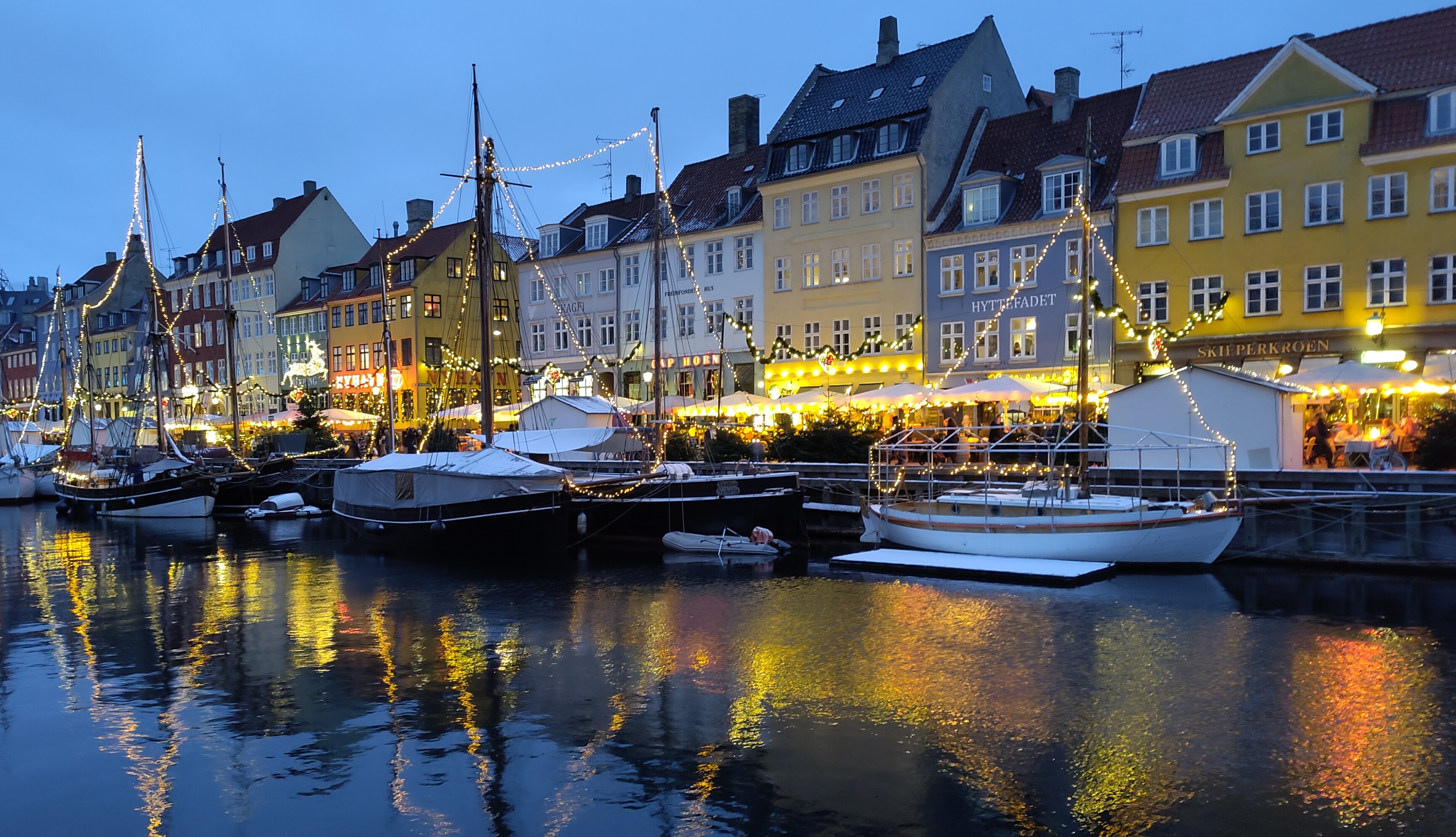 Late afternoon photo of Nyhavn with all the christmas light